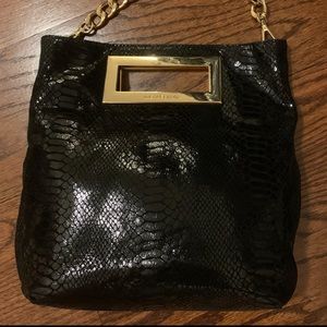 Michael Kors black crossbody handbag.
